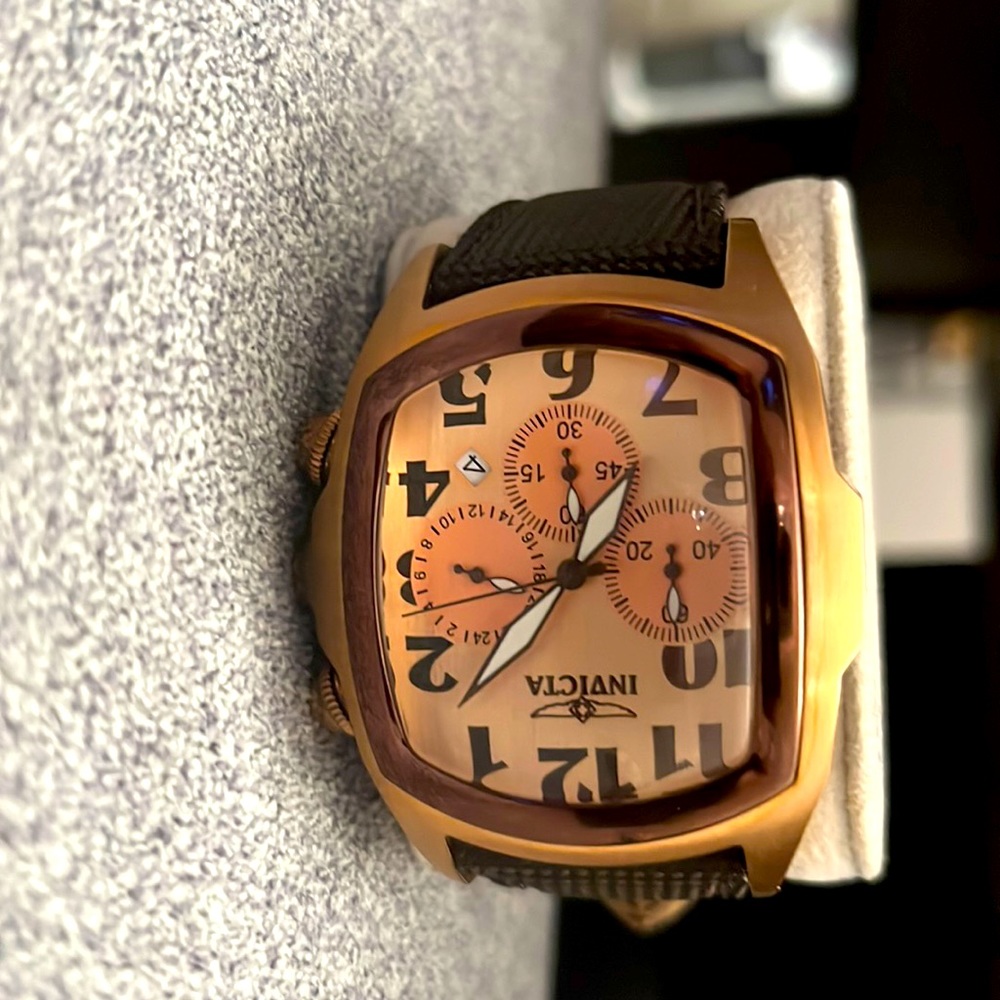 Rose Gold 44-45m face, techno fiber band, worn once, still new, just no box.